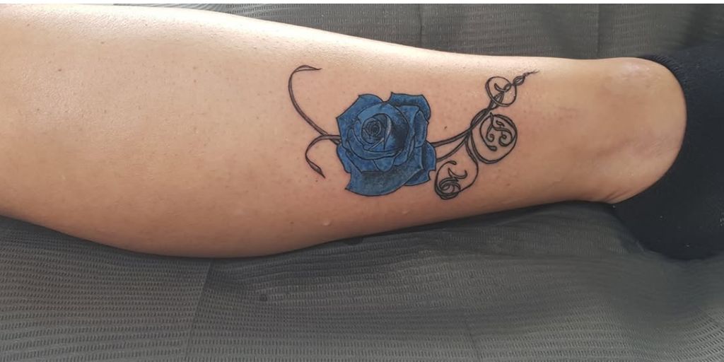 Tatoeage blauwe roos